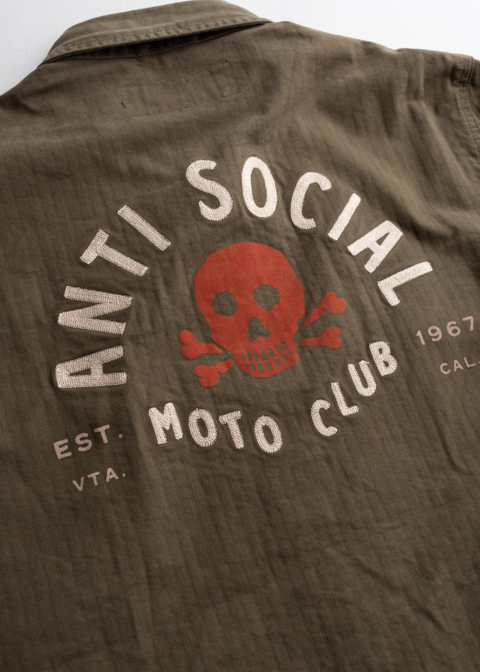 Close up of custom graphic on herringbone shirt, highlighting print detail and finish