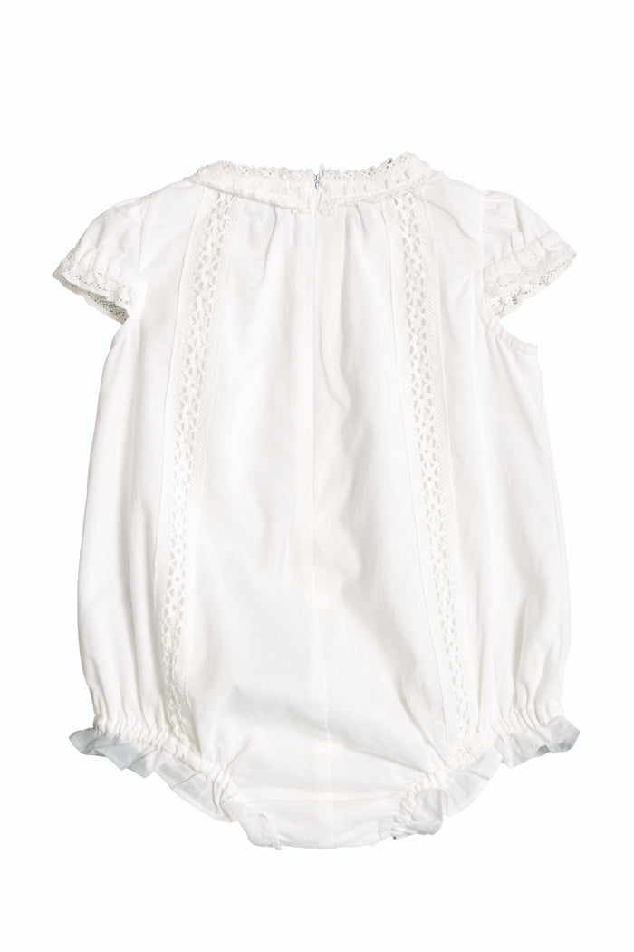 The Ivy City Co Baby Palermo Romper in White features short puffed sleeves, lace trim, and elastic leg openings—perfect for Mom and Me matching outfits. Shown on a plain white background.