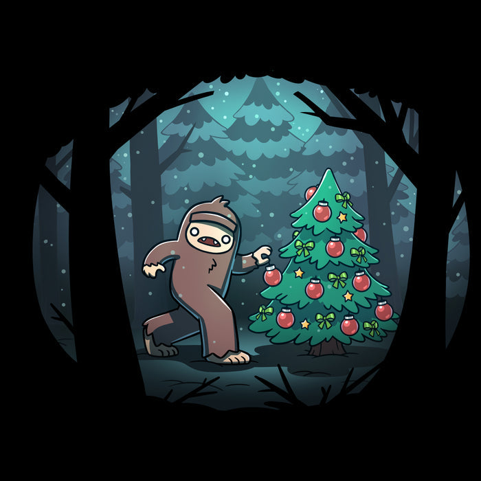Classic Cotton T-shirt_TeeTurtle black Bigfoot Christmas apparel featuring a sasquatch caught putting holiday decor on a tree in the middle of a snowy forest.