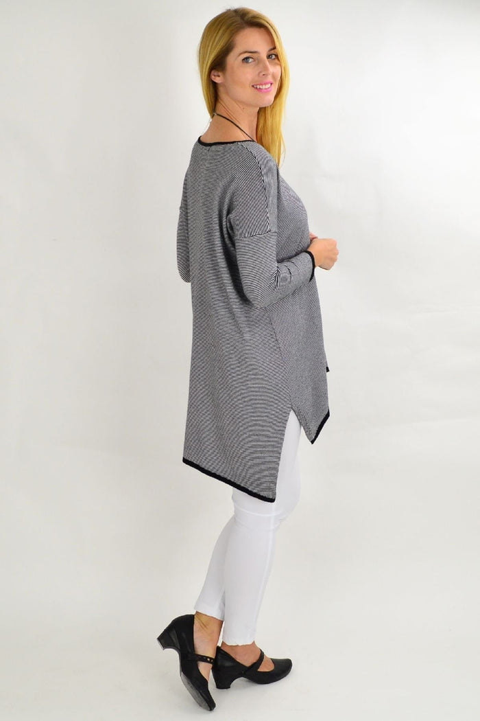 Black and grey striped Willow Tree tunic top with a relaxed fit, displayed on a hanger.