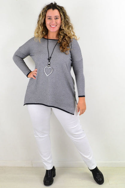 Willow Tree black candy stripe tunic top with long sleeves and relaxed fit, displayed on a hanger against a plain background.