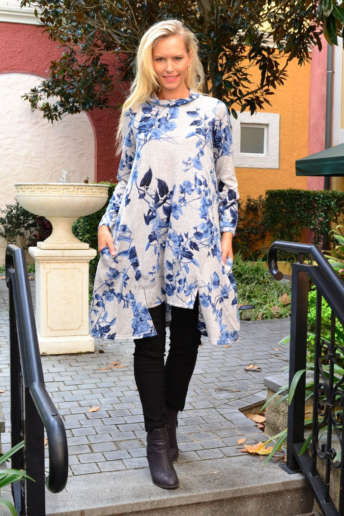 Blue Autumn Leaf fleece tunic dress by Hourglass featuring floral blue long-sleeve design and cozy fabric for autumn wear.