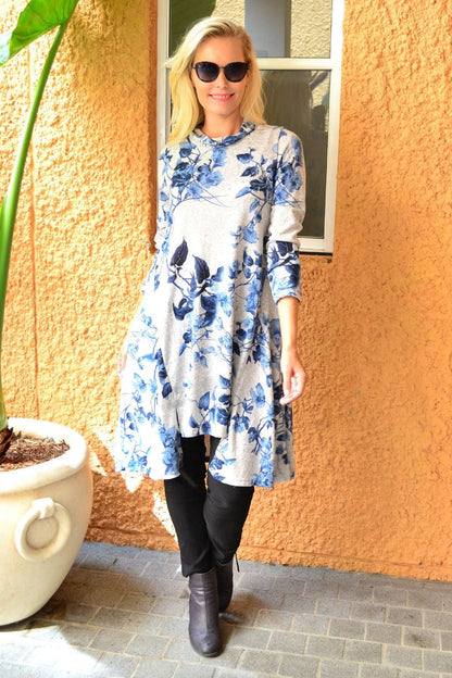 Blue autumn leaf fleece tunic dress by Hourglass, featuring cozy fleece fabric and a stylish autumn leaf pattern.