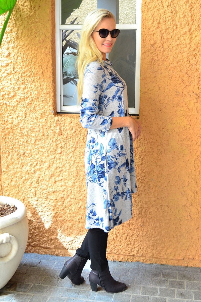 Blue autumn leaf fleece tunic dress by Hourglass, featuring a cozy fleece fabric and a leaf print design.