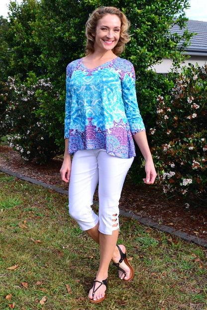 Blue Royal Tunic Tee from Zen Garden, casual women’s tunic with a relaxed fit and vibrant blue color, displayed on a hanger.