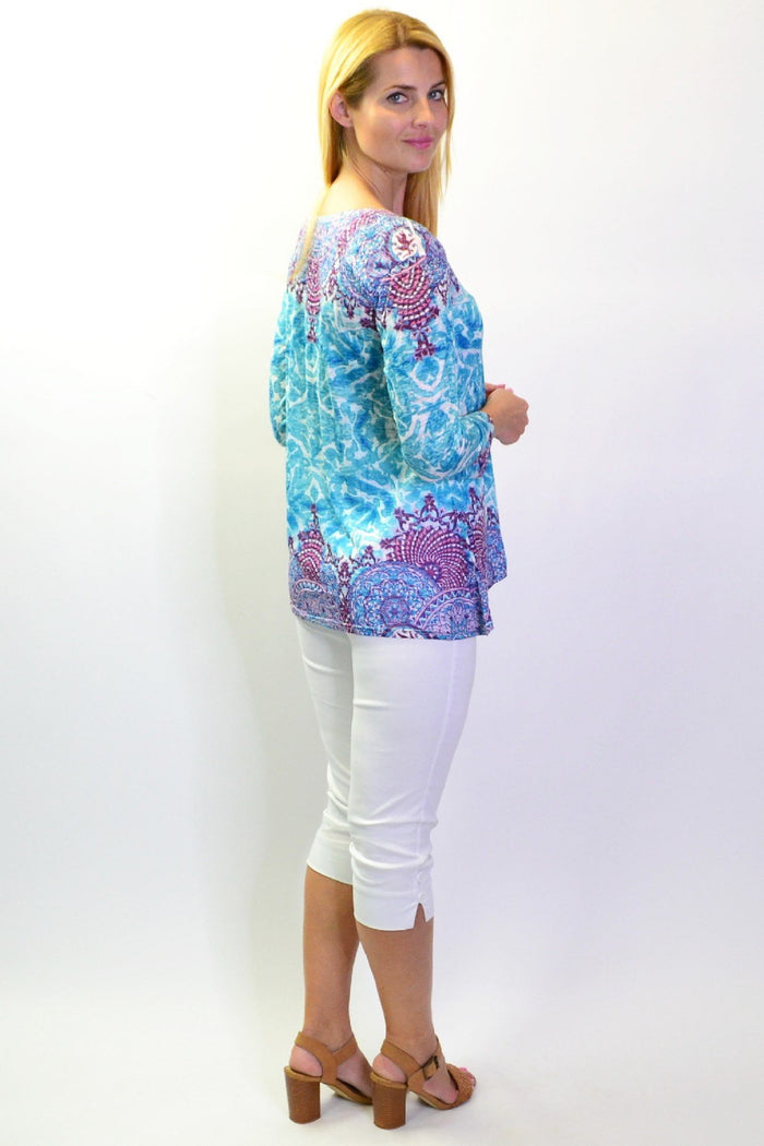 Blue Royal Tunic Tee by Zen Garden, lightweight casual tunic with a relaxed fit and long sleeves, displayed on a hanger.