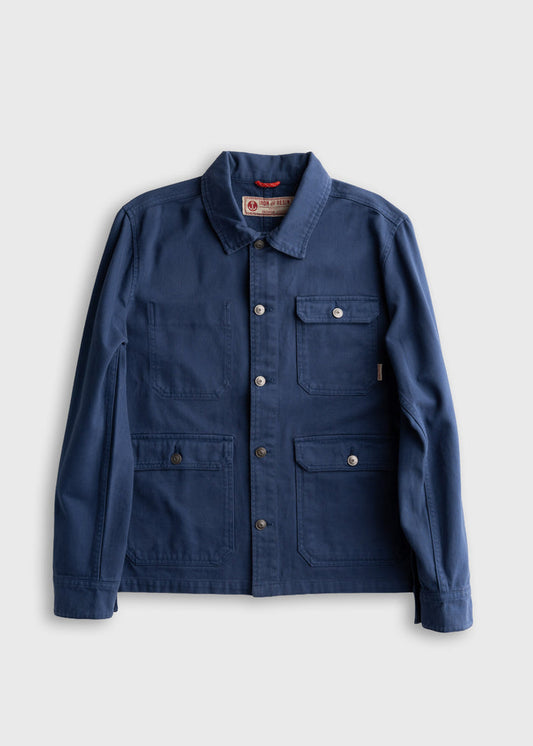 Blue work jacket with four pockets and button closure, displayed on a white background. Simple, classic design for versatile wear.
