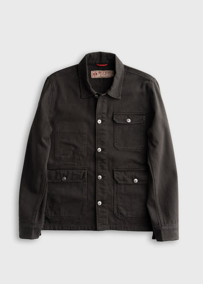 Men’s peach bull denim jacket with shank button closure and three front pockets, durable cotton workwear outerwear with mechanic style interior pockets and classic utility design
