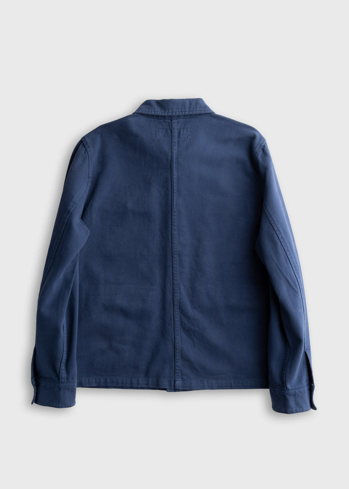 Men’s peach bull denim jacket with shank button closure and three front pockets, durable cotton workwear outerwear with mechanic style interior pockets and classic utility design