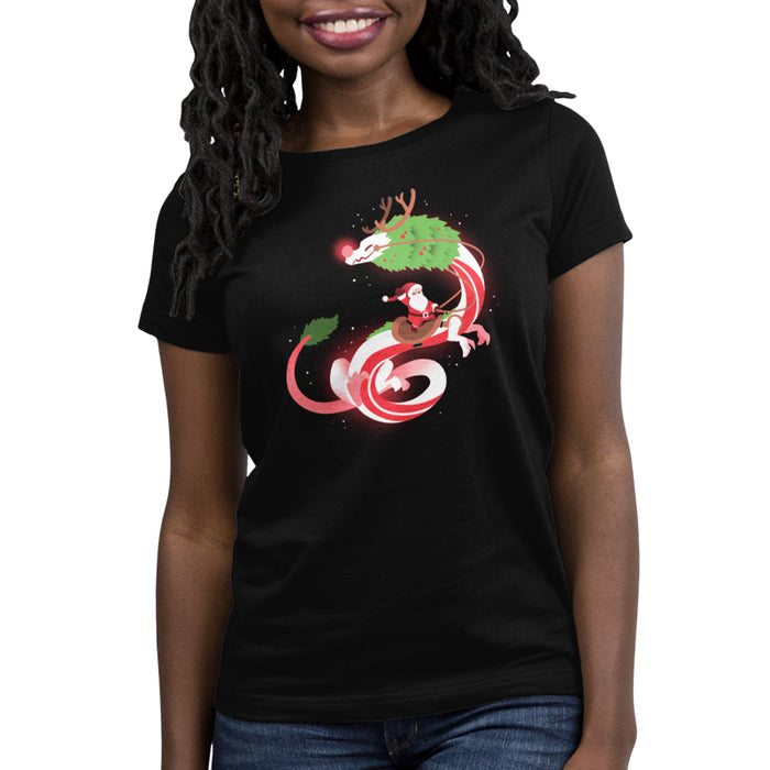 Premium Cotton T-shirt_TeeTurtle Christmas Dragon V2 Black apparel featuring an artistic candy cane dragon with a glowing nose and Santa riding on the back.