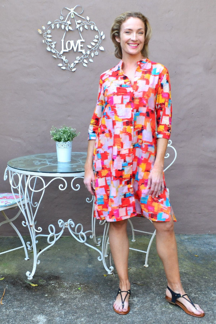 Color block shirt tunic dress by Ruby Rain featuring a relaxed fit, vibrant color panels, and long sleeves for casual wear.