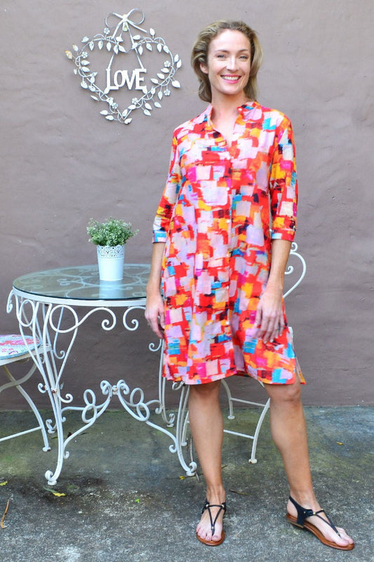 Color block shirt tunic dress by Ruby Rain featuring a relaxed fit, vibrant color panels, and long sleeves for casual wear.
