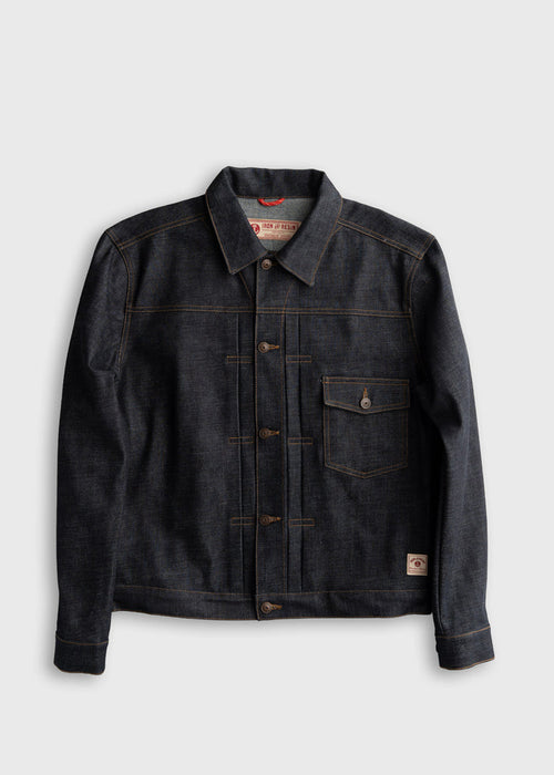 Dark denim jacket with brown stitching, buttoned front, and chest pocket. Features Iron & Resin label inside. Simple and stylish.