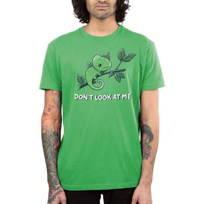 Premium Cotton T-shirt_Teeturtle Don't Look At Me apple t-shirt featuring a little cartoon Chameleon trying to cloak itself against leaves while on a branch with 'Don't look at me.' written underneath the image.
