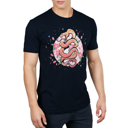 Premium Cotton T-shirt_TeeTurtle navy blue Enchanting Snake apparel featuring an orange snake coiling upwards with pink flowers and petals surrounding it.
