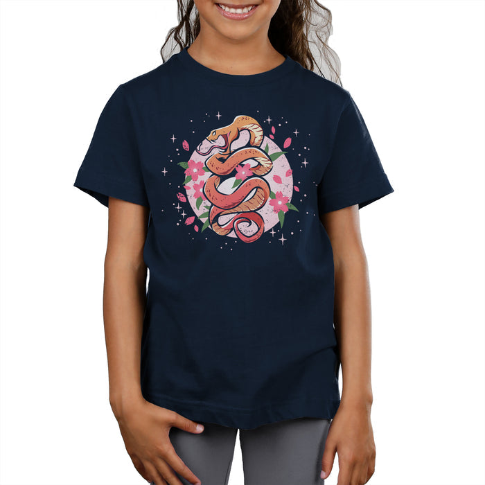 Premium Cotton T-shirt_TeeTurtle navy blue Enchanting Snake apparel featuring an orange snake coiling upwards with pink flowers and petals surrounding it.