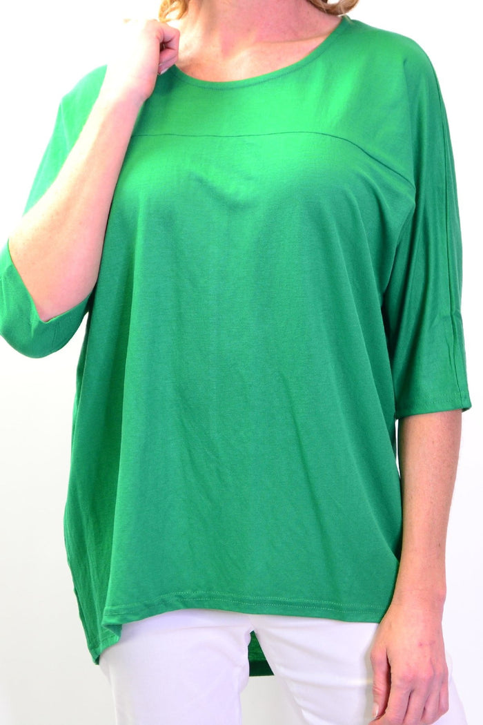 Grass green Stylius sloping sleeve tunic top displayed on a hanger with a flowing, relaxed fit and stylish design.