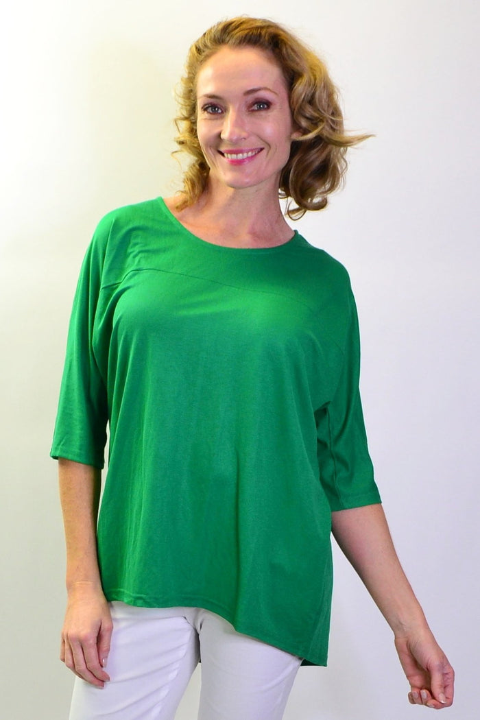 Grass green Stylius sloping sleeve tunic top made of jersey fabric, featuring a relaxed fit and stylish design for women.