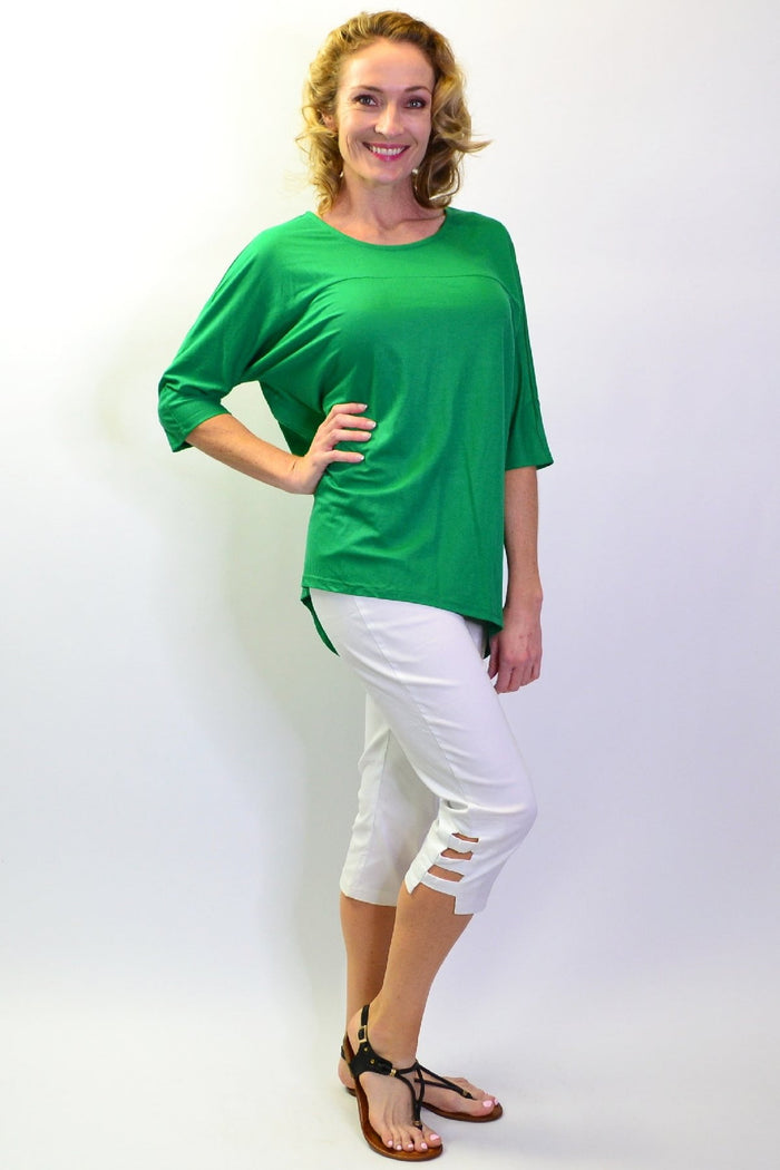 Grass green Stylius sloping sleeve tunic top made of soft jersey fabric, featuring a relaxed fit and stylish design.