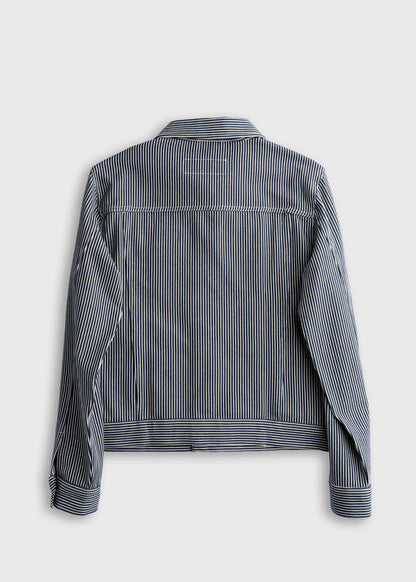 Back view of a blue and white striped denim jacket with long sleeves and a collar, displayed on a plain background.