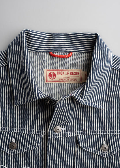 Close up of interior locker loop and neck area, showcasing practical workwear construction and hang detail