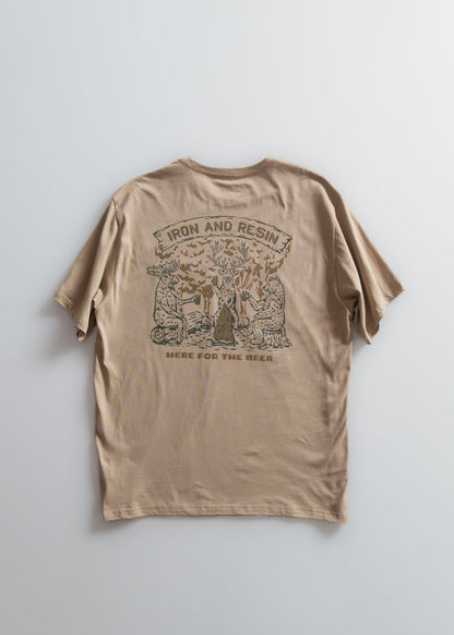 Tan t-shirt with "Iron and Resin" and "Here for the Beer" text, featuring animals around a tree.