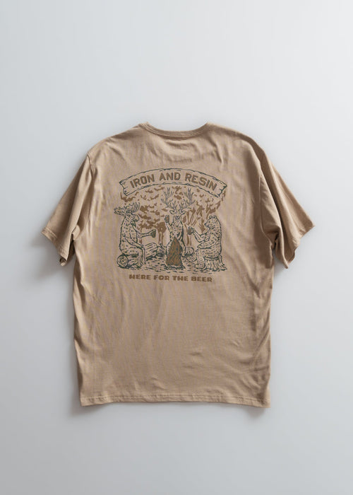 Tan t-shirt with "Iron and Resin" and "Here for the Beer" text, featuring animals around a tree.