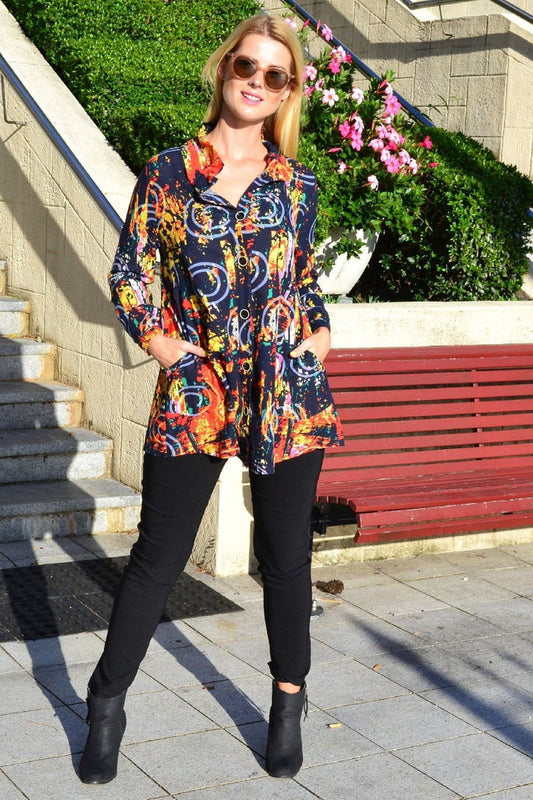 Ruby Rain Hot Spin Pocket high collar tunic shirt with long sleeves and side pockets, in a stylish, comfortable design.