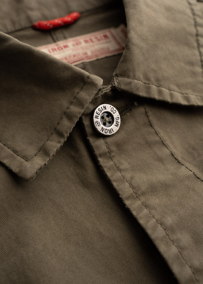 Men’s Prescott twill jacket in Olive Drab with button front, bellowed chest pockets and oversized flap waist pockets, durable cotton workwear outerwear with classic utility design