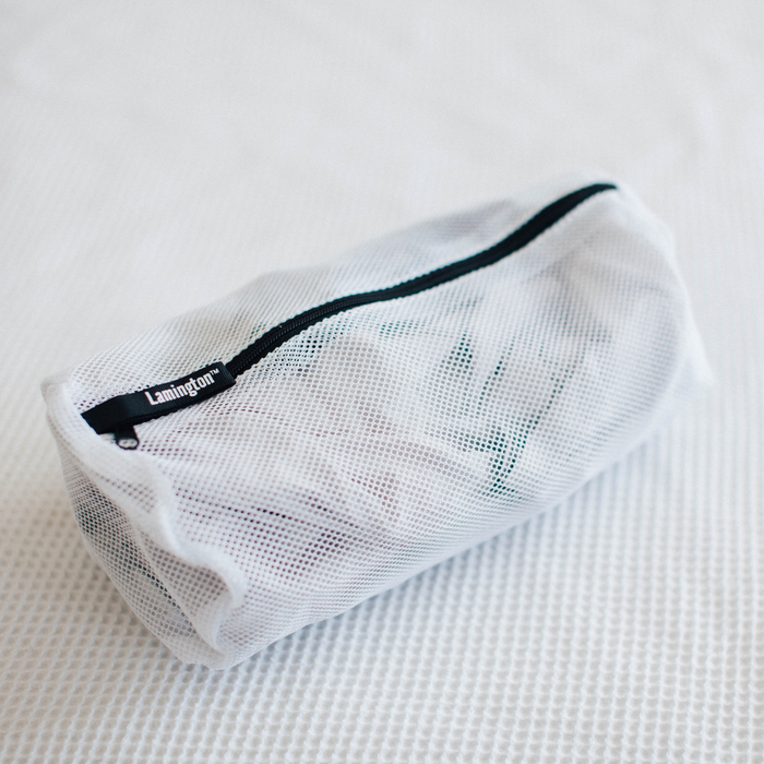 Sock-sized laundry bag. Black zipper