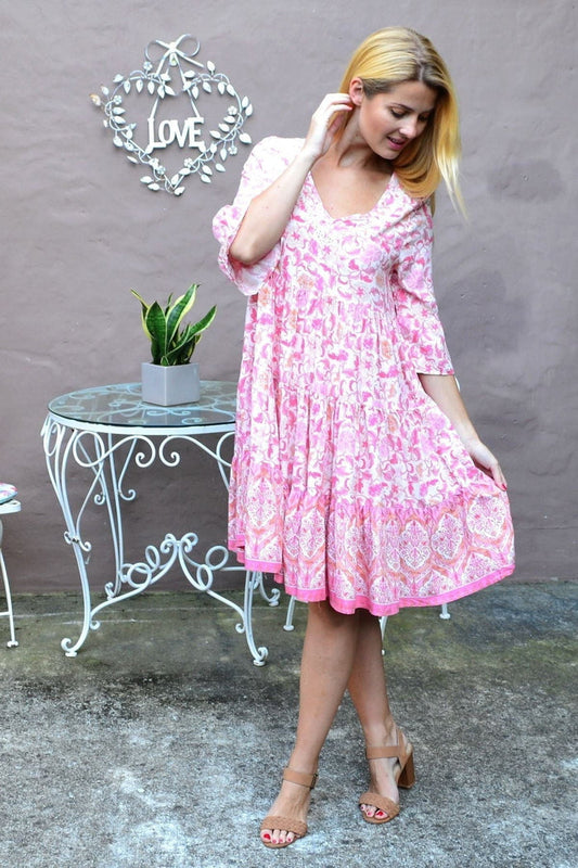 Pink leafy tiered tunic dress from New U Collection, featuring a flowy, layered design with leafy patterns and a relaxed fit.