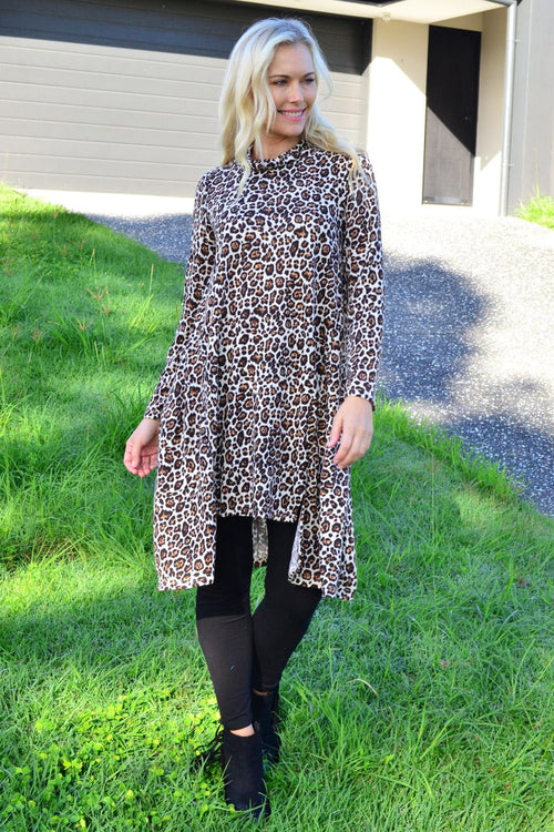 Leopard print high neck fleece tunic dress by Hourglass, featuring a cozy fleece fabric and stylish high neckline.