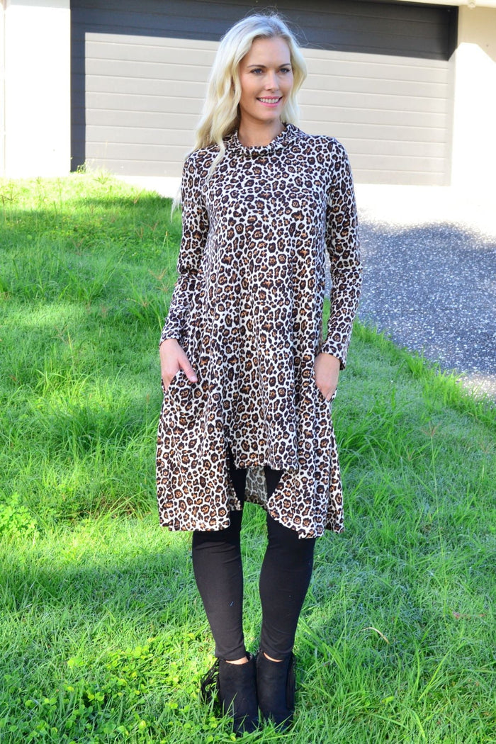 Leopard print high neck fleece tunic dress by Hourglass, featuring a cozy high neckline and stylish animal pattern.