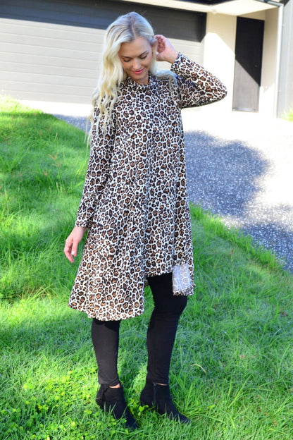 Leopard print high neck fleece tunic dress by Hourglass, featuring a cozy fleece fabric and a stylish high neckline.