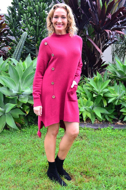 Magenta high neck cozy knit tunic jumper by Wishstone, showing a close-up of the textured fabric and high neckline design.