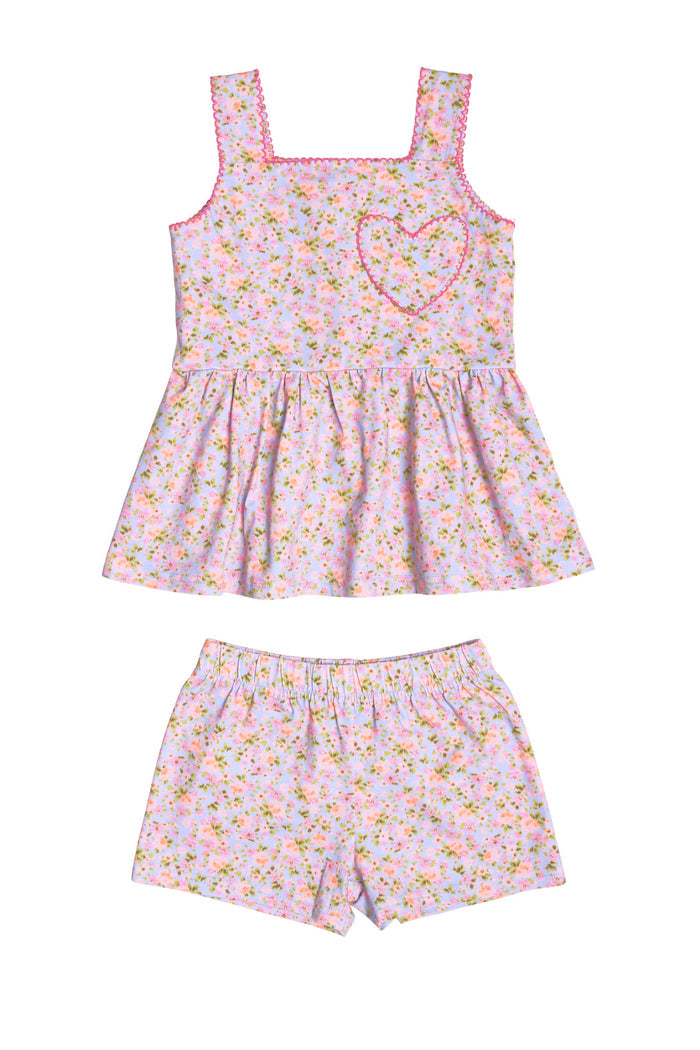 The Mini Blair Play Set in Vibrant English Garden by Ivy City Co is a matching sleeveless top with heart detail and elastic-waist shorts, made from soft floral stretch fabric—perfect for playful days.