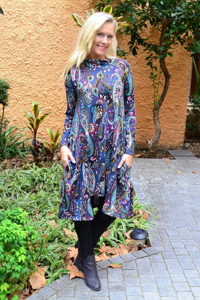Hourglass Penelope Paisley Fleece Tunic Dress shown in a cozy, patterned fleece fabric with long sleeves and a relaxed fit.