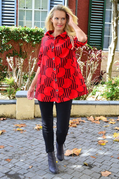 Red deck of cards print high collar tunic shirt by Ruby Rain featuring a vibrant, playful design with a fitted silhouette.