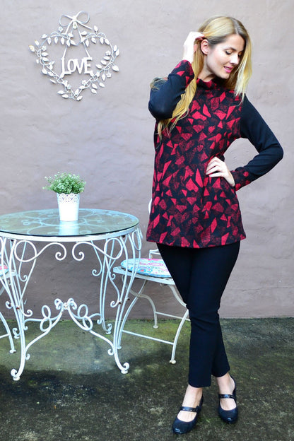 Red abstract pattern tunic top by Whispers, stylish women's winter tunic with a modern design and comfortable fit.