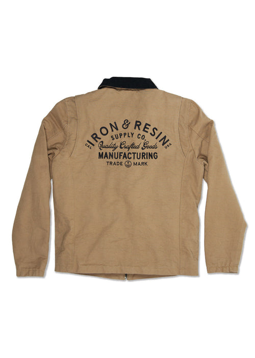 Tan jacket with "Iron & Resin Supply Co. Quality Crafted Goods Manufacturing" printed on the back in black text.