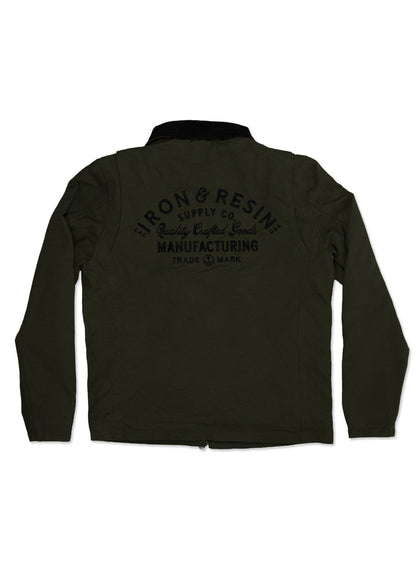 Dark green jacket with "Iron & Resin Supply Co." logo on back, showcasing quality crafted goods and manufacturing trademark.