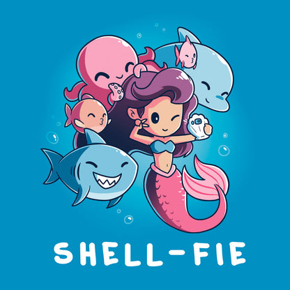 Classic Cotton T-shirt_TeeTurtle sapphire blue Shell-fie apparel featuring a mermaid taking a selfie underwater with a shell phone, surrounded by smiling sea creatures. Caption reads, 'Shell-fie'.