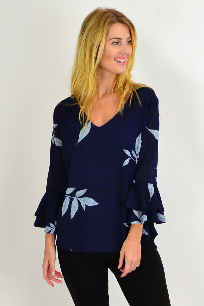 Blue Stylius Spanish Leaf Bell Sleeve Tunic Blouse with flowy fabric and relaxed fit, perfect for casual or stylish occasions.