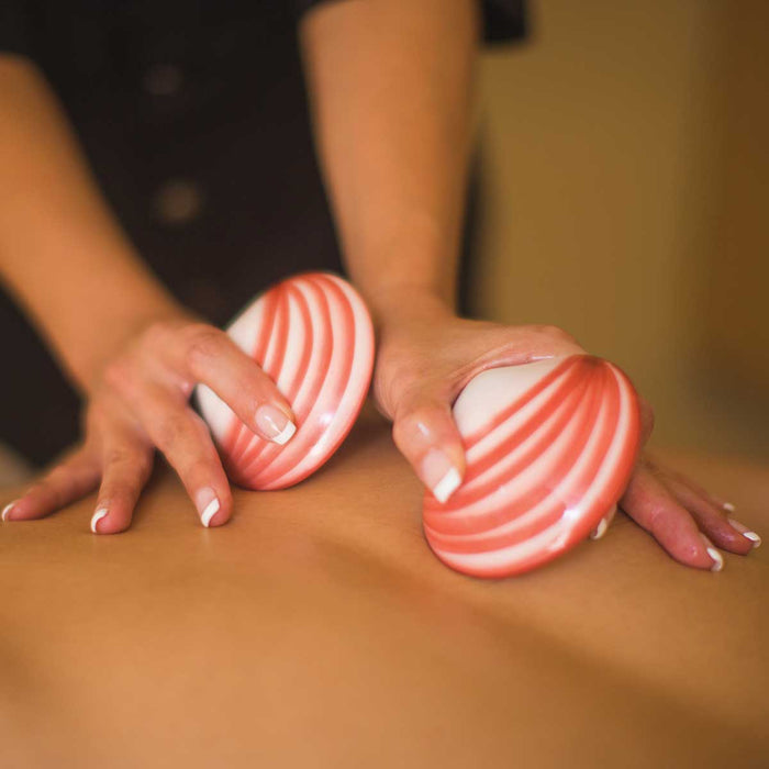 ThermaBliss Ceramic Codacia Shells 2-Pack Hand-painted ceramic massage shells Thermal ceramic massage shells for spa treatments Non-porous ceramic massage shells Warm and chilled therapy ceramic shells Professional thermabliss ceramic massage tools