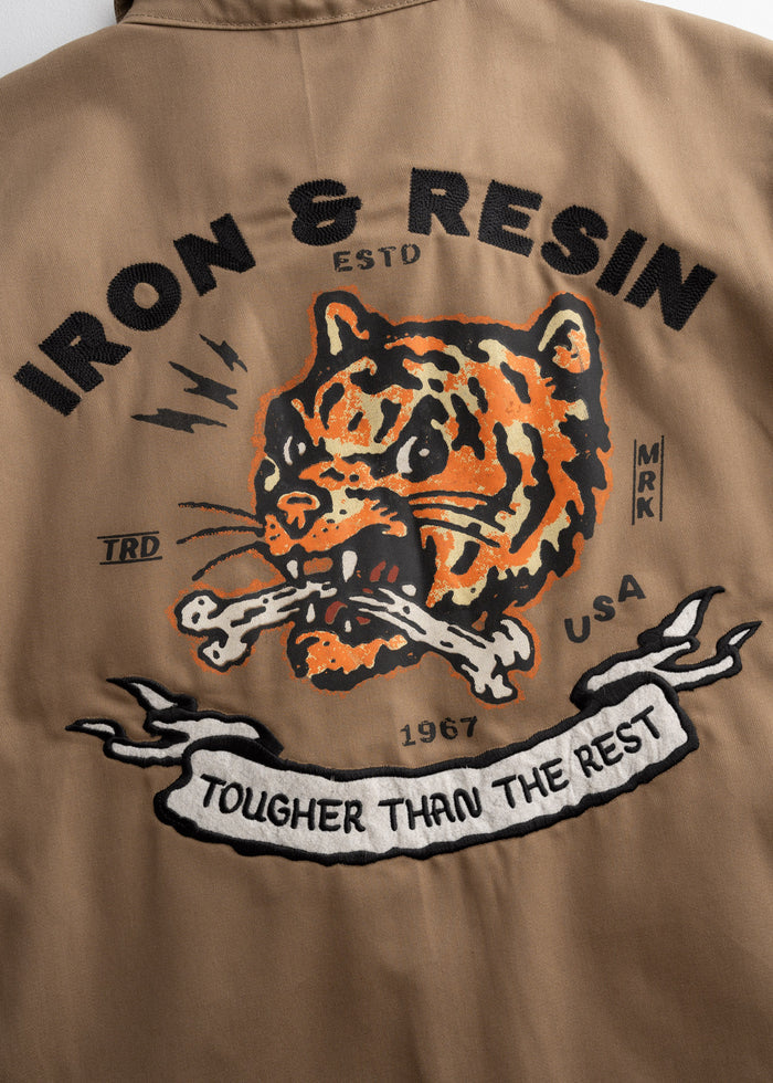 Close up of custom graphic, highlighting stitching detail and design