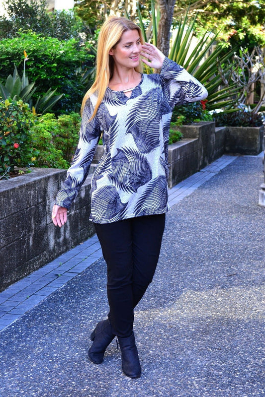 Wings of a Feather fleece peep hole tunic top by I Love Tunics, featuring a cozy fleece fabric and stylish peep hole neckline.