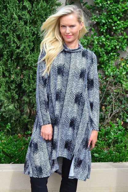 Black and grey zigzag fleece tunic dress by Hourglass, featuring a cozy, stylish design and relaxed fit.